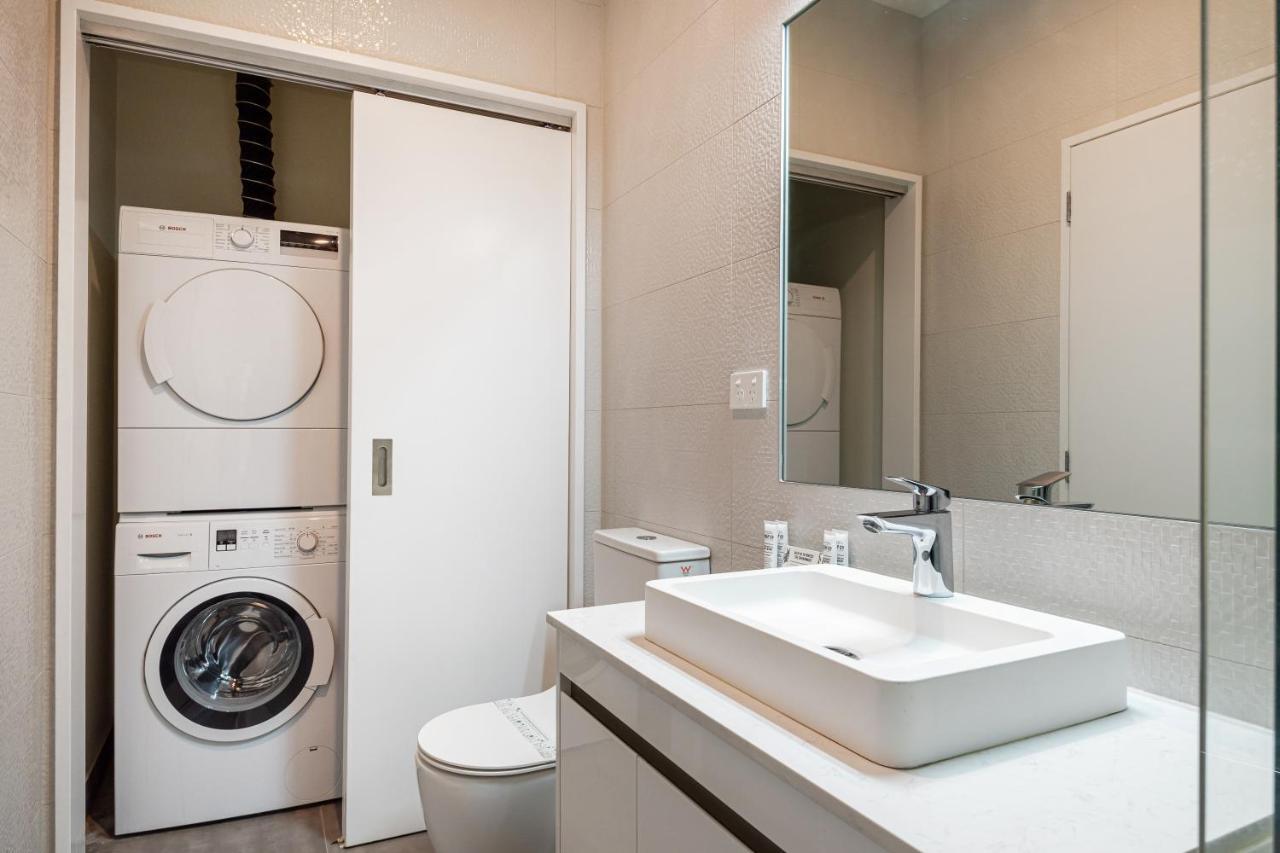 Fernz Motel & Apartments Birkenhead Auckland Exterior photo A laundry room