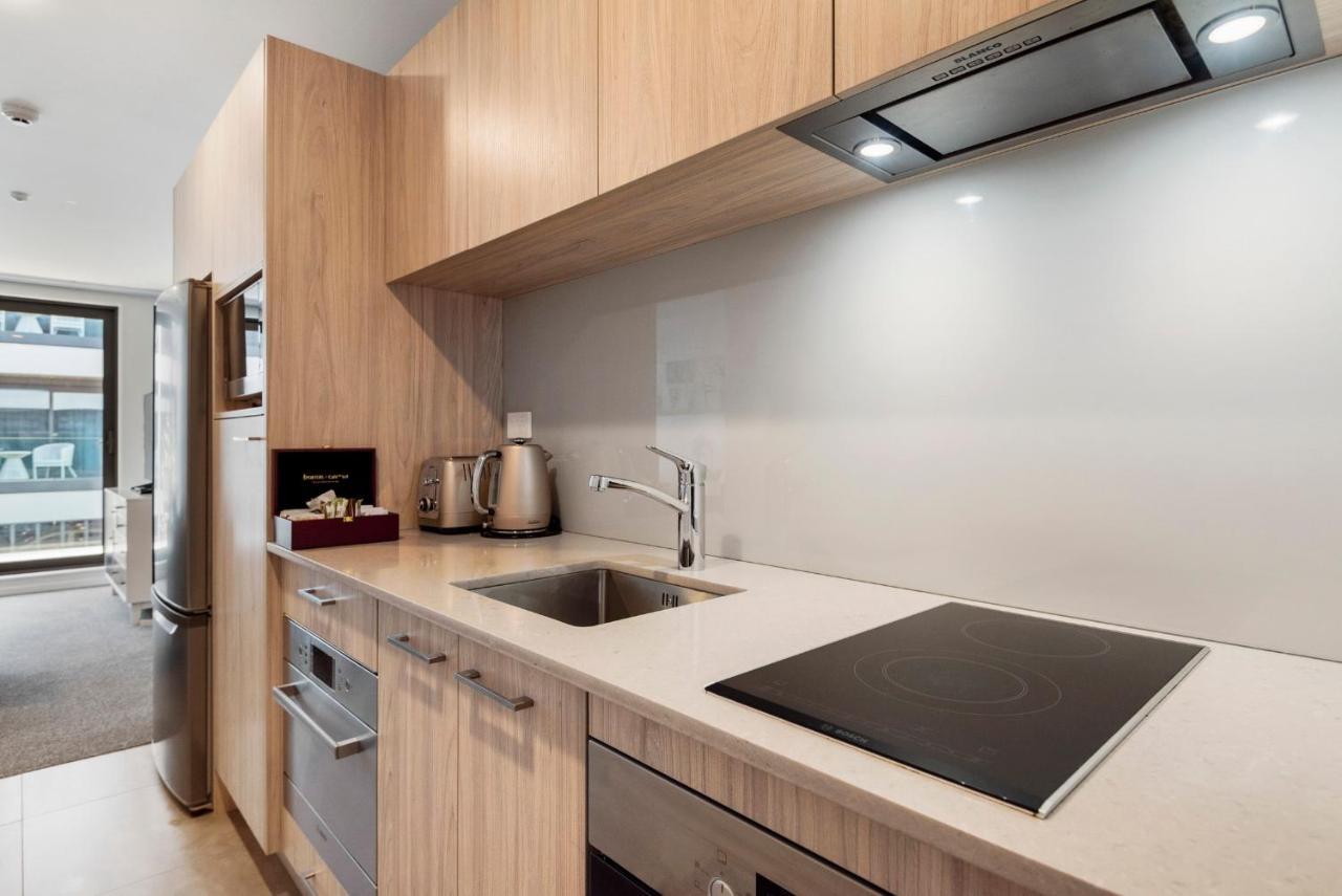 Fernz Motel & Apartments Birkenhead Auckland Exterior photo A modern kitchen